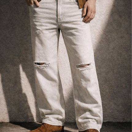 IVORY DISTRESSED BOOTCUT DENIM