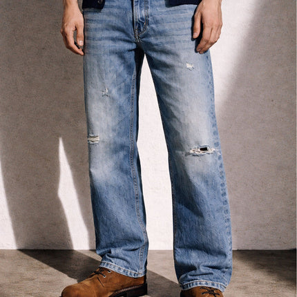 STONE WASH DISTRESSED BOOTCUT DENIM