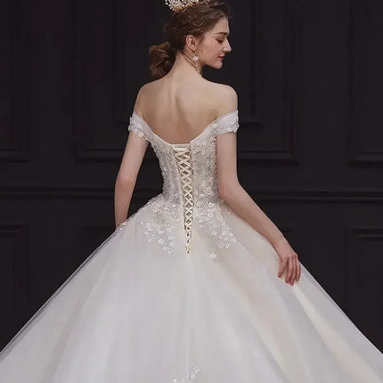 Luxury Off-Shoulder Wedding Dress - Handmade Lace Ball Gown | Femstylo