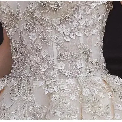 Luxury Off-Shoulder Wedding Dress - Handmade Lace Ball Gown | Femstylo