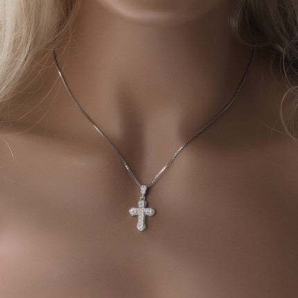Gold-plated, diamond-encrusted mini cross necklace