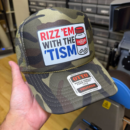 Rizz 'Em With The 'Tism Trucker Hat