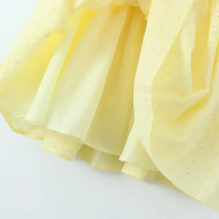 YENKYE Sexy Elegant Women Hollow Out Embroidery Yellow Sling Mini Dress Low Waist Lace Up Bandage Party Dresses Birthday Robe
