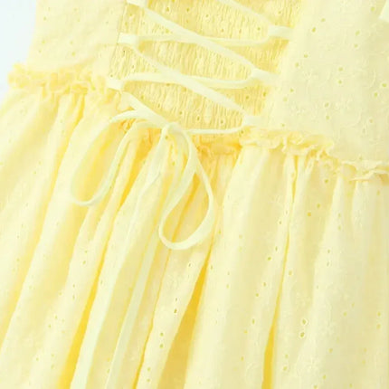 YENKYE Sexy Elegant Women Hollow Out Embroidery Yellow Sling Mini Dress Low Waist Lace Up Bandage Party Dresses Birthday Robe