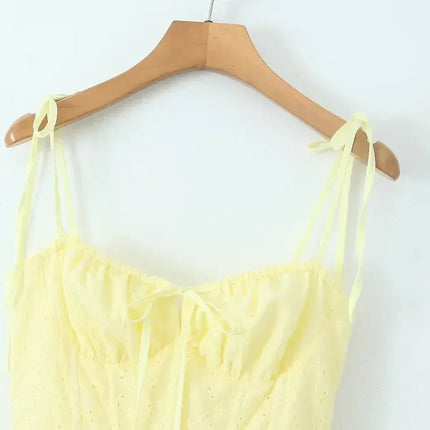 YENKYE Sexy Elegant Women Hollow Out Embroidery Yellow Sling Mini Dress Low Waist Lace Up Bandage Party Dresses Birthday Robe