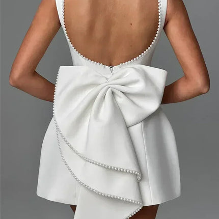 Mozision Pearl Bow Backless Sexy Mini Dress For Women Robe Fashion Zipper Sleeveless High Waist A-line Club Party Dress Elegant