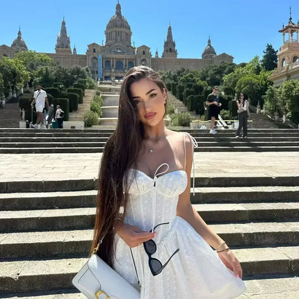 YENKYE Sexy Elegant Women Hollow Out Embroidery Yellow Sling Mini Dress Low Waist Lace Up Bandage Party Dresses Birthday Robe