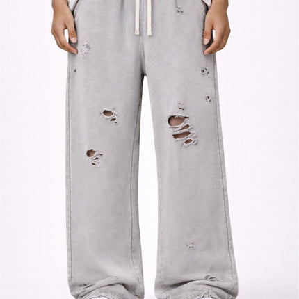 GREY DESTROYED SWEATPANTS